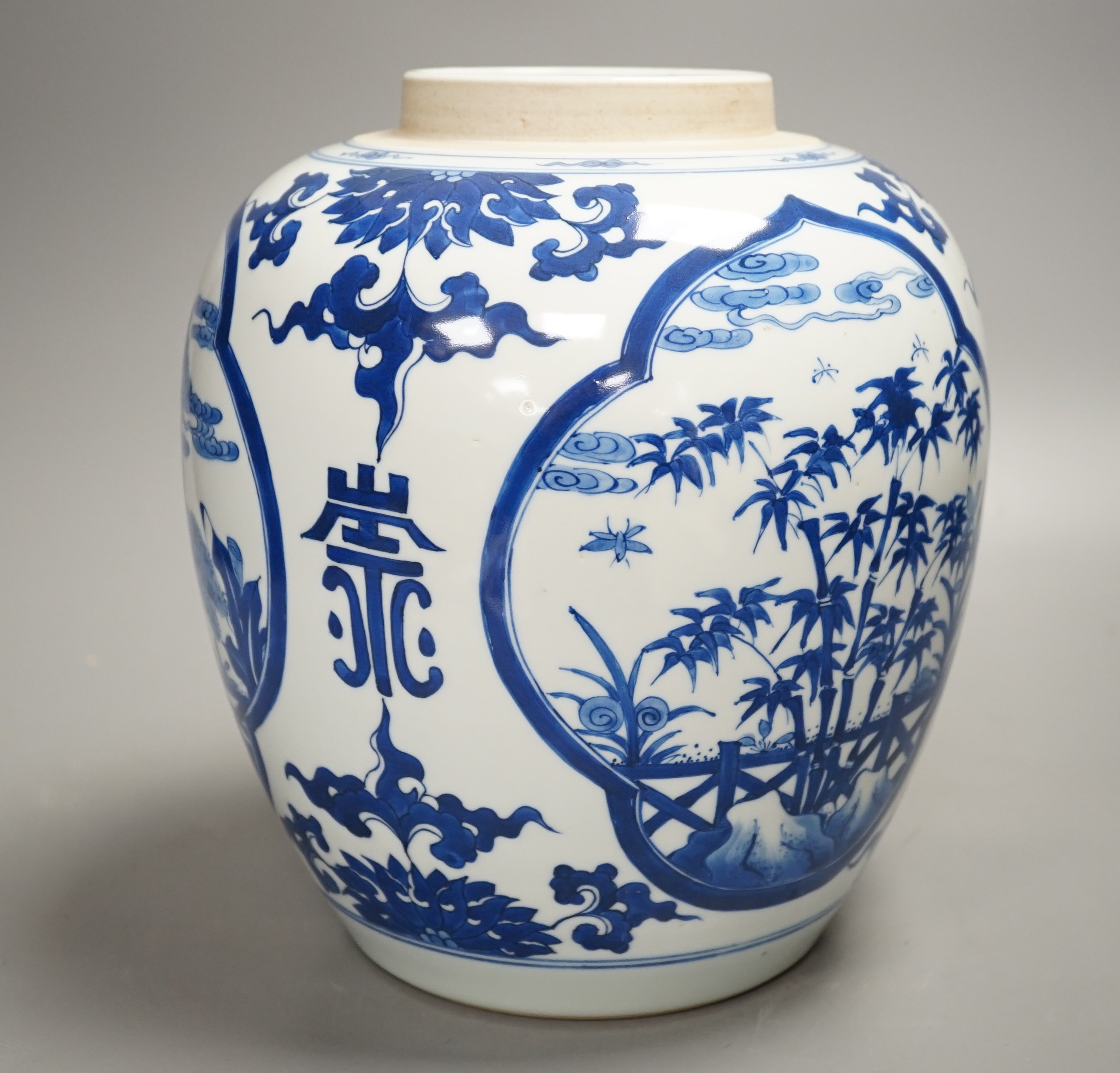 A Chinese blue and white jar, lacking cover 23cm